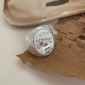 Vintage 925 sterling silver portrait ring with relief face and textured brick pattern band