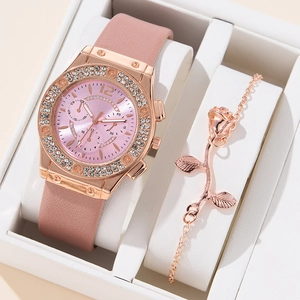 Women's rose gold watch set with pink leather strap and matching rose bracelet in gift box