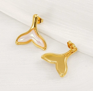 Macro detail of 18K gold-plated fishtail studs with iridescent resin inlay and butterfly backs
