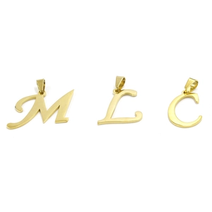 Close-up of gold-plated stainless steel initial pendants for letters M, L, and C