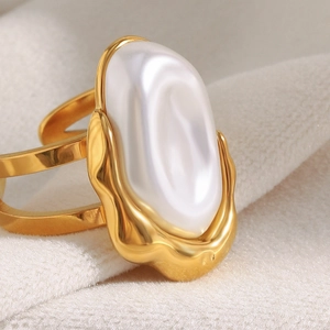 Baroque irregular faux pearl open ring in 18K gold plated stainless steel on beige fabric