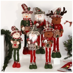 Three plush Christmas dolls featuring Santa, Snowman, and Reindeer with telescopic legs
