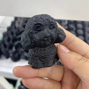 Handcrafted matte black obsidian poodle puppy figurine made of premium resin material