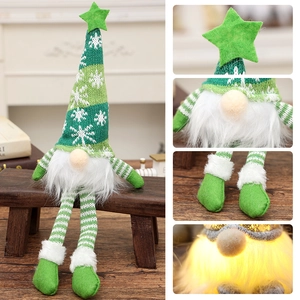 Lighted Christmas gnome plush with green knitted hat, star topper and dangling long legs