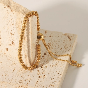 Elegante bracciale a sfere in acciaio inossidabile placcato oro 18K con chiusura regolabile