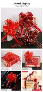 Large red wedding car bow detail with gold edging and I Love You More script