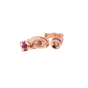 Rose gold necklace clasp set with pink baguette gemstones on a white background