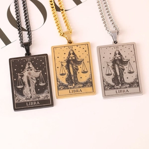 Detailed display of square Libra necklaces in black, gold, and silver finishes