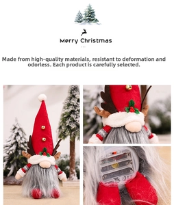Detailed view of glowing Christmas gnome with sequined antlers and battery compartment