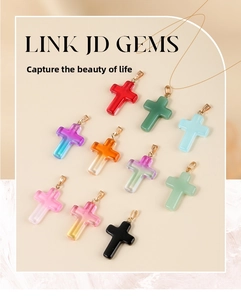 Detailed view of colorful glass cross pendants with secure gold metal buckles