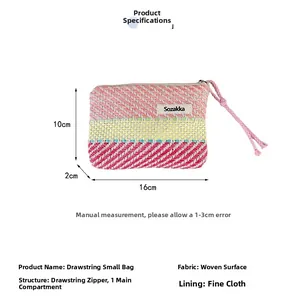 Colorful striped woven cosmetic bag details with long zipper pull and 16x10x2cm dimensions