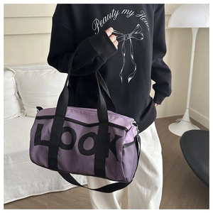 Large purple sport duffel bag with LOOK lettering and adjustable black shoulder straps