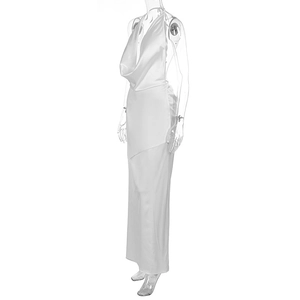 Detail of white satin cowl neck maxi dress with elegant open back and draped silhouette