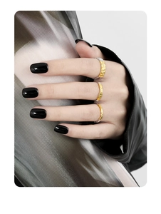 Detailed view of three textured S925 silver rings with gold and silver bicolor plating