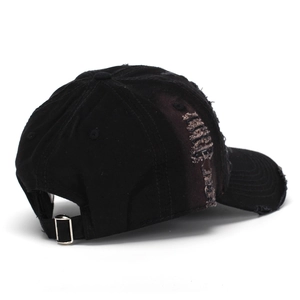 Distressed black denim baseball cap with vintage worn finish and adjustable metal buckle