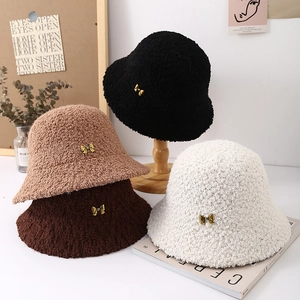 Cute plush rabbit fur bucket hat in four colors with a subtle gold bow detail
