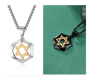 Macro detail of octagonal hexagram pendants in silver and black with gold star accents