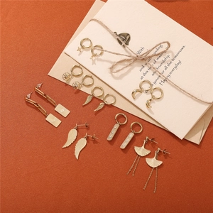 Minimalist 18K gold plated stainless steel earrings set with star and moon charms