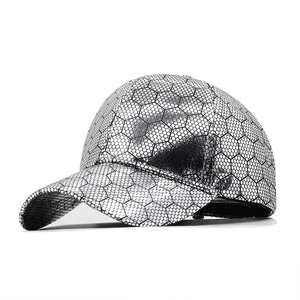 Silver reflective baseball cap with black honeycomb hexagonal pattern in futuristic style
