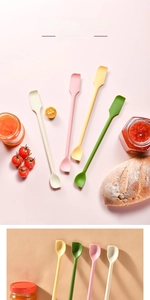 Detailed view of dual-ended silicone jam spatulas in four soft macaron pastel colors