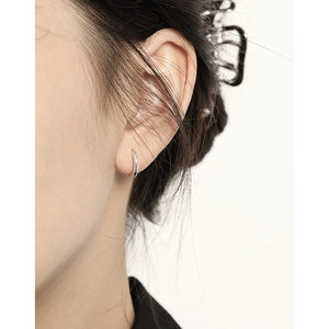Minimalist S925 sterling silver geometric hoop earring shown on a model