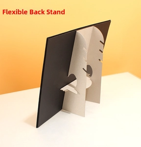 Detail of a flexible back stand on a black jewelry display board with multiple adjustable angles