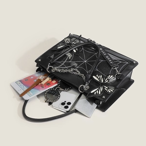 Internal view of gothic butterfly tote bag showing spacious capacity for daily essentials