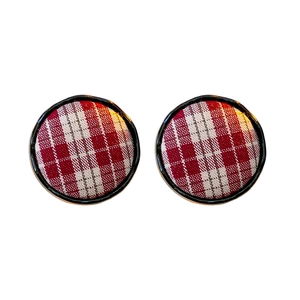 Classic round stud earrings featuring red and white plaid fabric with a black frame