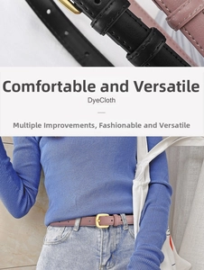Detail of slim black and pink leather belts with gold metal buckles for jeans