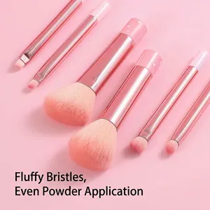 Peach pink makeup brush set with soft fluffy bristles and metallic pink starry handles