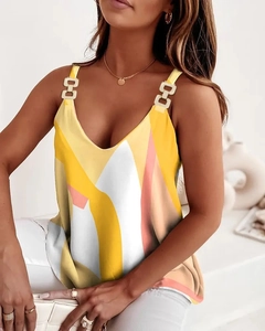 Detail of summer sleeveless tank top featuring geometric patterns and chain strap buckles
