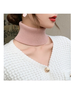 Detail of pink ribbed knit turtleneck dickey collar for women showing elastic texture