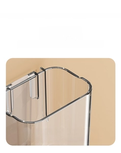 Detail of rounded corners and smooth edges on a clear bathroom storage shelf