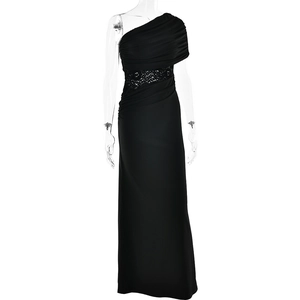 Detail of elegant black one-shoulder evening dress featuring lace patchwork waist design