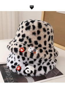Detail of plush leopard print bucket hat with cute panda and bear cartoon patches