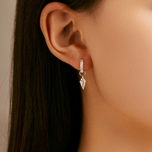 S925 sterling silver geometric diamond drop earrings shown on a model portrait