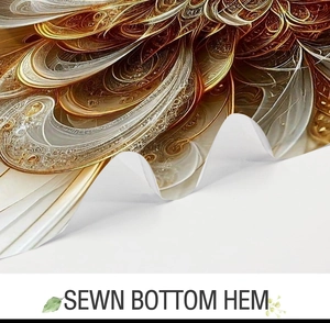 Close-up of sewn bottom hem detail on decorative fabric shower curtain with bronze patterns