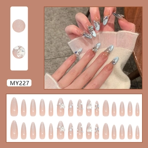 Blue and pink gradient cat eye press-on nails with heart rhinestones and glitter