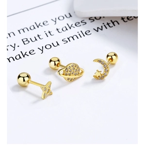 Detail of star, planet, and moon 925 silver stud earrings with screw backs and zircon stones
