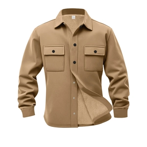 Detail of khaki fleece-lined work shirt featuring dual chest pockets and classic collar