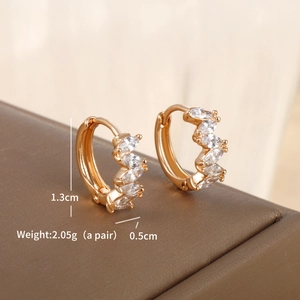 Detail of gold-plated geometric hoop earrings with marquise-cut zircon 1.3cm x 0.5cm