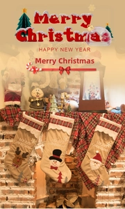 Three-piece knitted Christmas stockings with Santa, snowman and elk hung by a fireplace