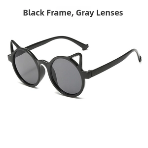Detailed view of kids' cat-ear sunglasses with black frames and gray lenses