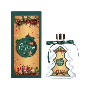 Christmas tree shaped reed diffuser set in festive gift box for holiday home fragrance