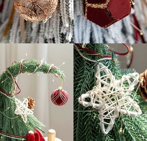 Gros plan sur les boules en velours rouge et étoiles en rotin pour sapin de Noël