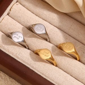 Polished 18K gold and silver plated stainless steel signet rings with LTJ engraving