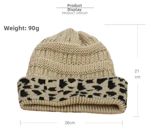 Detail of leopard print knitted beanie with 90g weight and 21cm height specifications