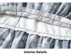 Vue macro détaillée de la doublure et des coutures de la robe en mousseline