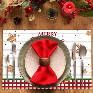 Gingerbread man Christmas place mat set with festive red stripes and Merry text design