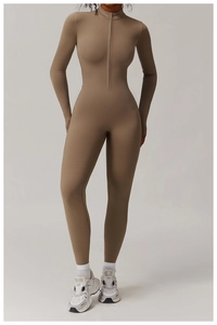 Detail view of khaki thermal yoga bodysuit featuring front zipper and thumbhole cuffs